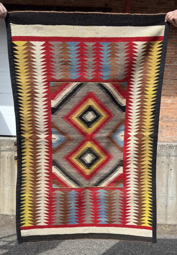 Teec Nos Pos Navajo Indian Rug: 36" by 56".
