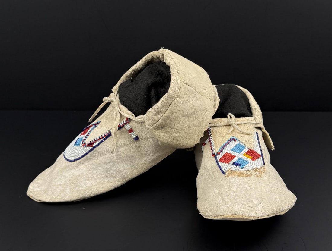 Blackfoot Native American Indian Beaded Moccasins: 11" by 5" by 4 1/4". First Quarter of the 20th Century.