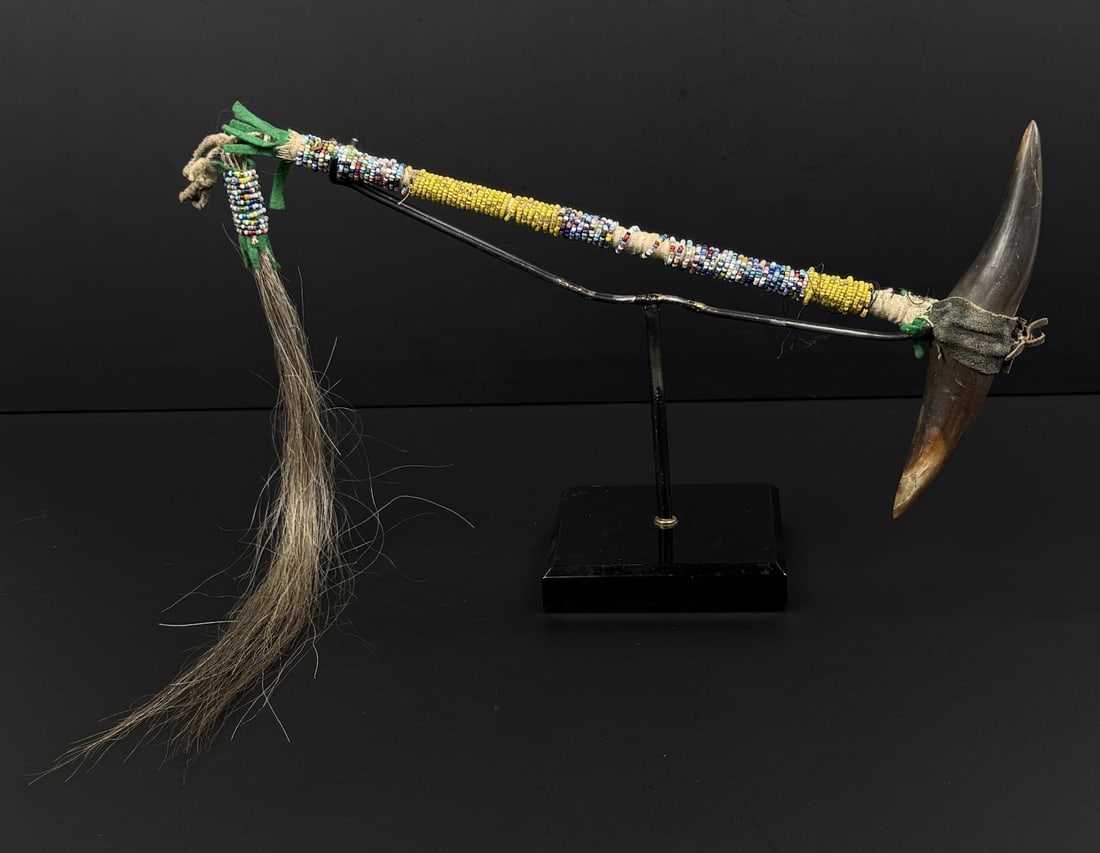 Sioux Native American Indian Buffalo War Club: Used by Medicine Men and for Ceremonial Purposes. Buffalo Horn with Crazy Bead shaft. 25 5/8" long with drop. Last Quarter of the 19th Century.