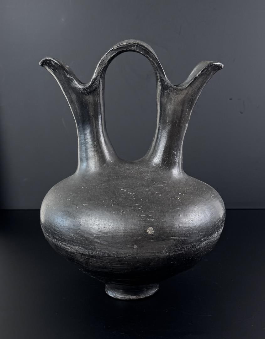 Candelario Suazo Santa Clara Pueblo Wedding Vase: 12 7/8" by 9 7/8" by 9 1/2". Neck has been repaired.