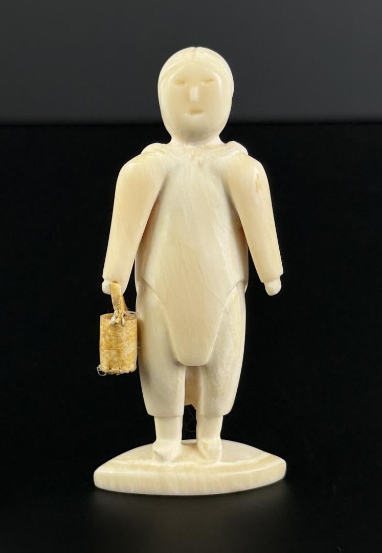 Agnes Nulluq Alaskan Inuit Eskimo Ivory Carving: Native made prior to 1972. This item cannot be shipped to Oregon, California, Hawaii, New York, New Jersey, Internationally, or any other state that prohibits. 3 3/4" by 1 5/8" by 3/4".