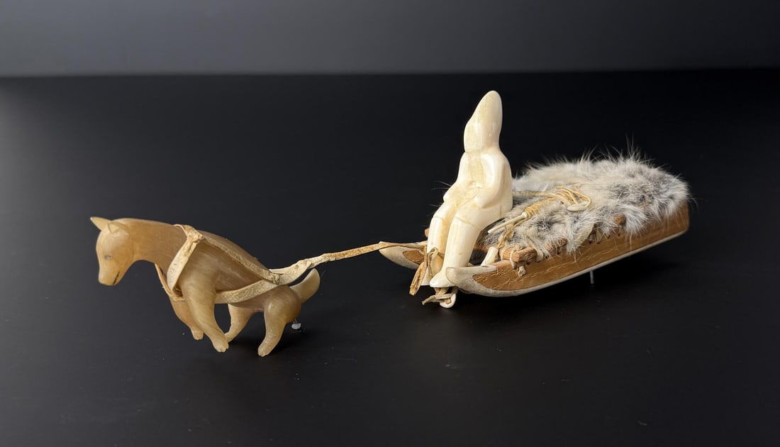 Alaskan Inuit Eskimo Baker Lake Sled Dog Team: 9" by 2 5/8" by 2 1/2". Native made prior to 1972. This item cannot be shipped to Oregon, California, Hawaii, New York, New Jersey, Internationally, or any other state that prohibits.