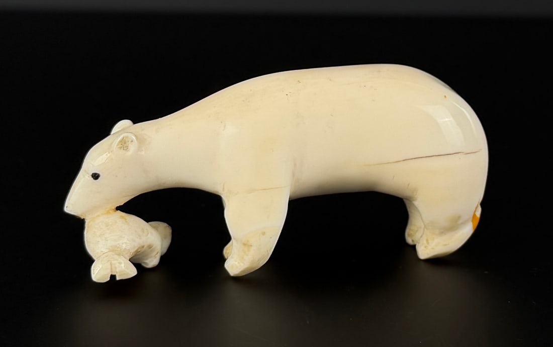 Alaskan Inuit Eskimo Carved Ivory Polar Bear: 3" by 1 1/4" by 1". Native made prior to 1972. This item cannot be shipped to Oregon, California, Hawaii, New York, New Jersey, Internationally, or any other state that prohibits.