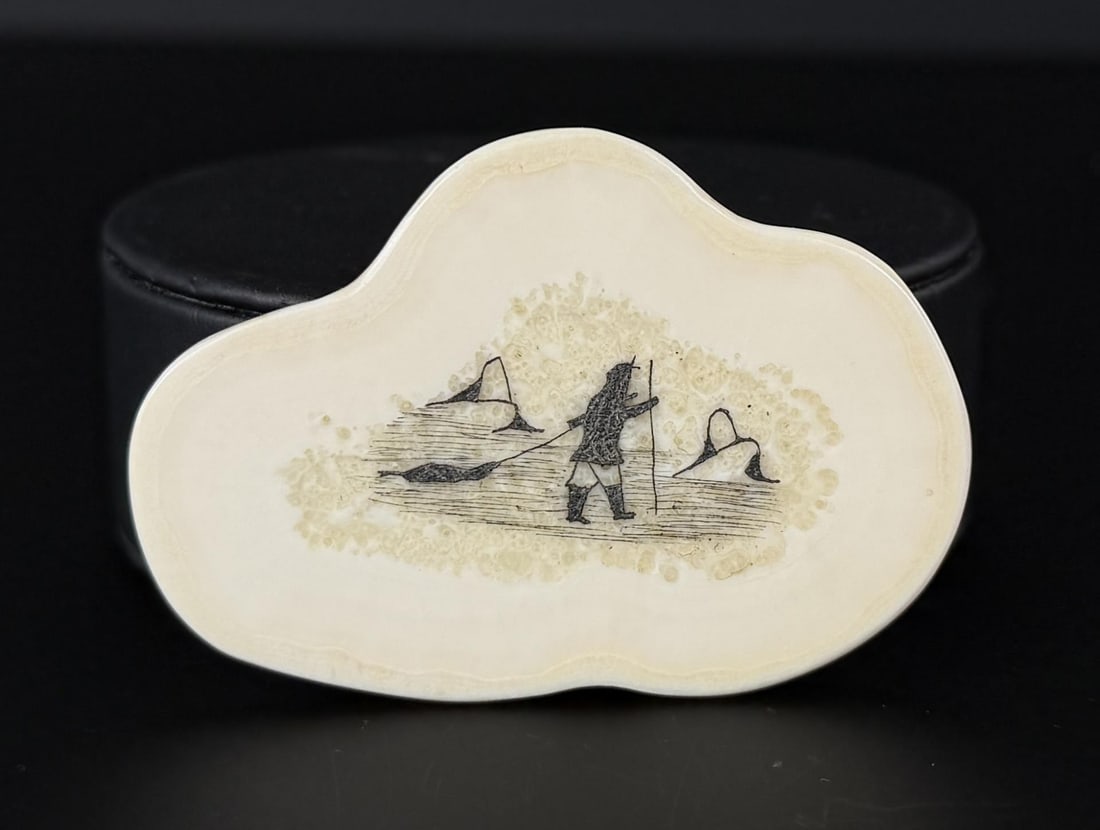 Davidee Itulu Eskimo Scrimshaw Ivory Panel: 2 1/2" by 1 3/4". Native made prior to 1972. This item cannot be shipped to Oregon, California, Hawaii, New York, New Jersey, Internationally, or any other state that prohibits.