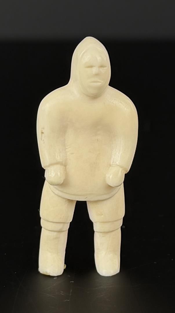 Alaskan Inuit Eskimo Carved Ivory Man: 1 7/8" by 5/8" by 5/8". Native made prior to 1972. This item cannot be shipped to Oregon, California, Hawaii, New York, New Jersey, Internationally, or any other state that prohibits.