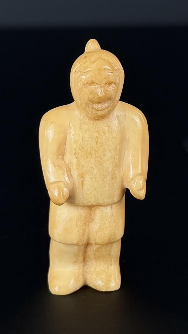 Alaskan Inuit Eskimo Carved Ivory Man: 2" by 7/8" by 3/4". Native made prior to 1972. This item cannot be shipped to Oregon, California, Hawaii, New York, New Jersey, Internationally, or any other state that prohibits.