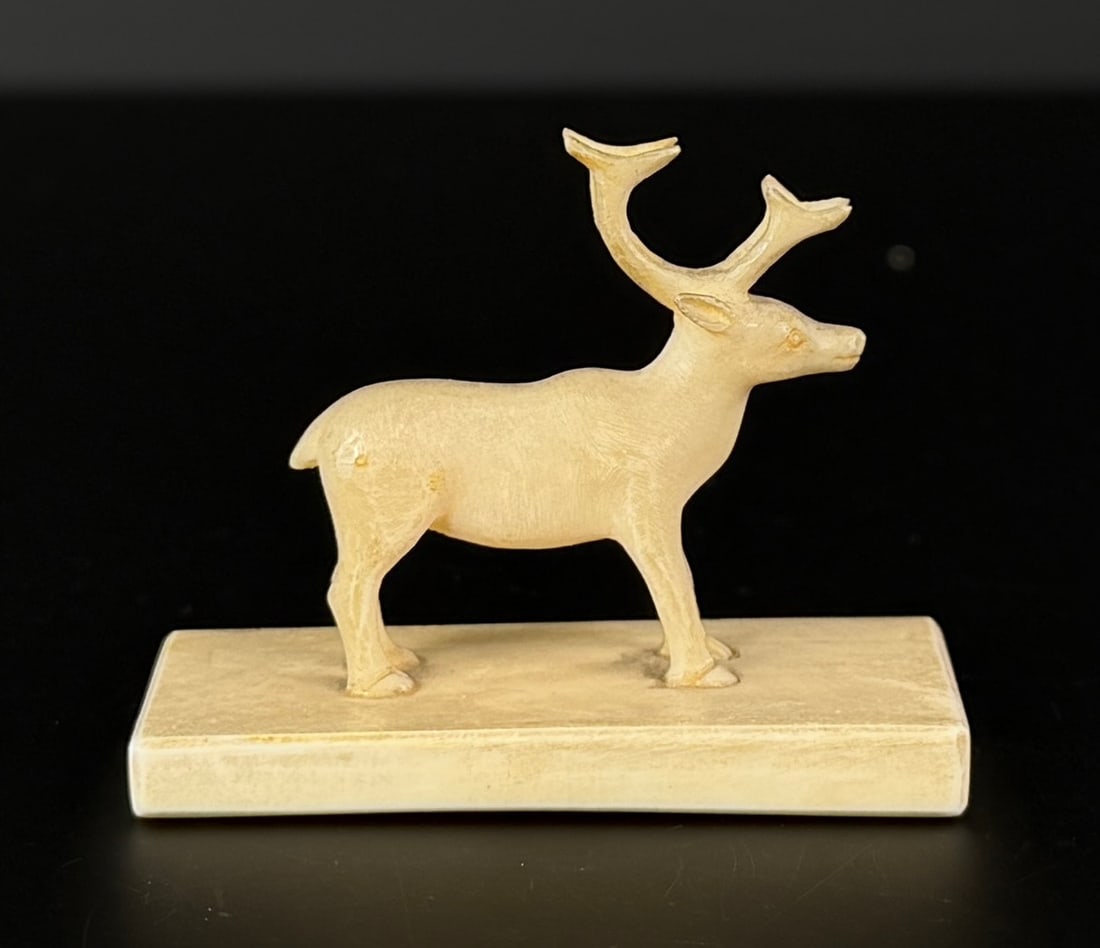 Alaskan Inuit Eskimo Carved Ivory Caribou: 2 1/8" by 1 1/2" by 1". Native made prior to 1972. This item cannot be shipped to Oregon, California, Hawaii, New York, New Jersey, Internationally, or any other state that prohibits.