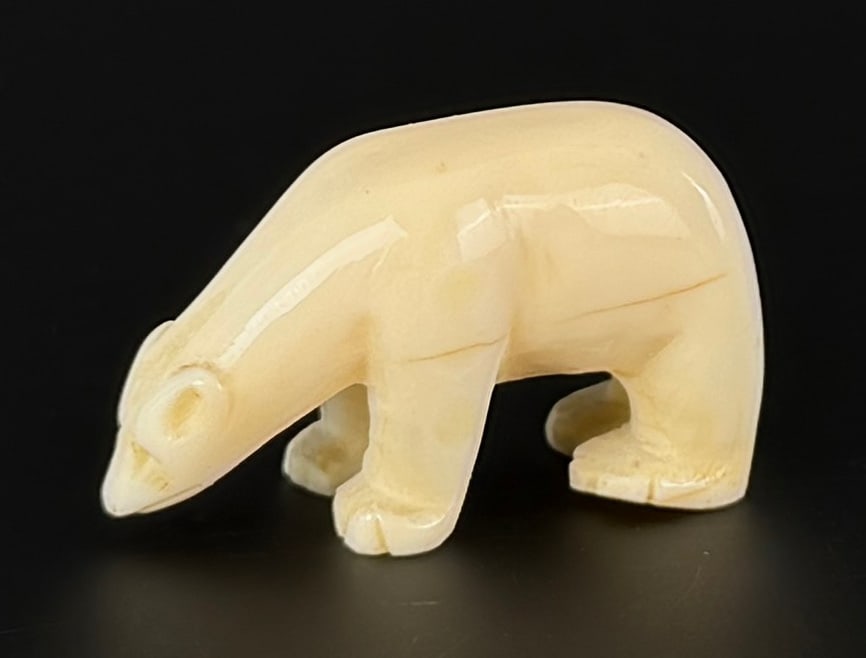 Alaskan Inuit Eskimo Carved Ivory Polar Bear: 1 1/2" by 5/8" by 5/8". Native made prior to 1972. This item cannot be shipped to Oregon, California, Hawaii, New York, New Jersey, Internationally, or any other state that prohibits.