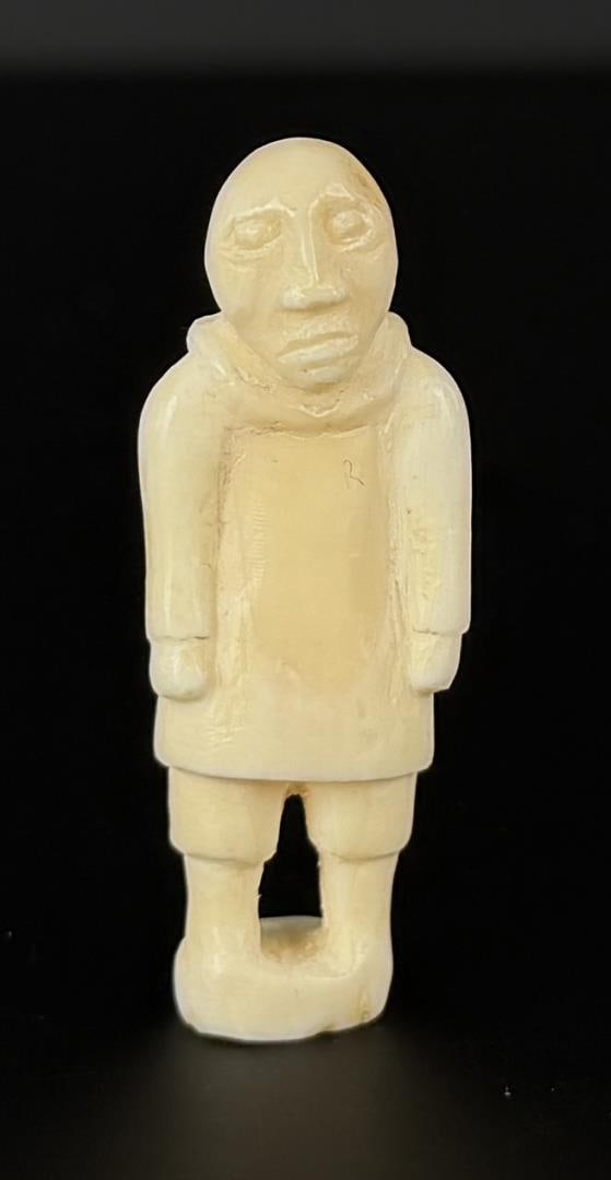 Alaskan Inuit Eskimo Carved Ivory Man: 1 5/8" by 1/2" by 1/2". Native made prior to 1972. This item cannot be shipped to Oregon, California, Hawaii, New York, New Jersey, Internationally, or any other state that prohibits.