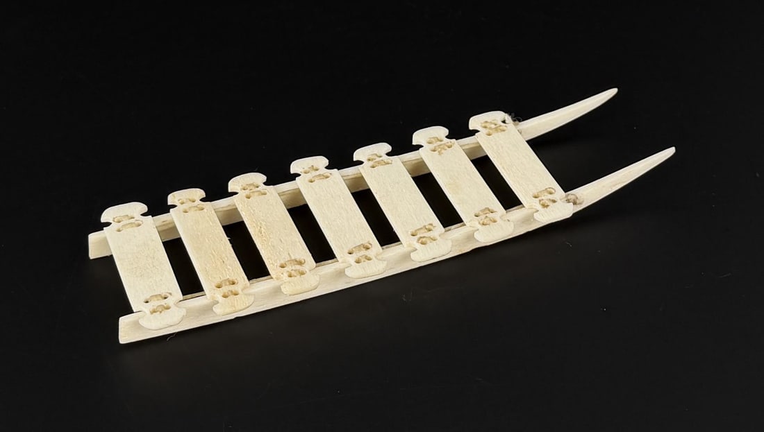 Alaskan Inuit Eskimo Carved Miniature Dog Sled: 6" by 1 3/4" by 1/4". Native made prior to 1972. This item cannot be shipped to Oregon, California, Hawaii, New York, New Jersey, Internationally, or any other state that prohibits.