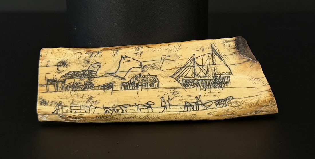 Antique Alaskan Inuit Eskimo Scrimshaw Panel: Showing sled dog team, village, and trading boat. 4 7/8" by 1 5/8" by 1/4". Native made prior to 1972. This item cannot be shipped to Oregon, California, Hawaii, New York, New Jersey, Internationally,