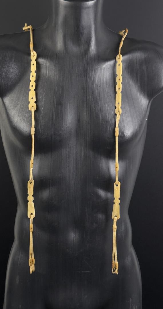 Alaskan Inuit Eskimo Ivory Suspenders: 34 1/2" long. Native made prior to 1972. This item cannot be shipped to Oregon, California, Hawaii, New York, New Jersey, Internationally, or any other state that prohibits.