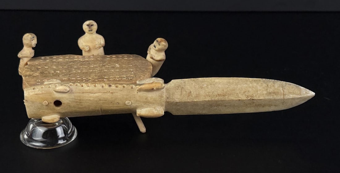 Alaskan Inuit Eskimo Walrus Ivory Cribbage Board: Assembled from earlier components, the side appears to be a snow knife. 8 1/2" long. Native made prior to 1972. This item cannot be shipped to Oregon, California, Hawaii, New York, New Jersey, Interna
