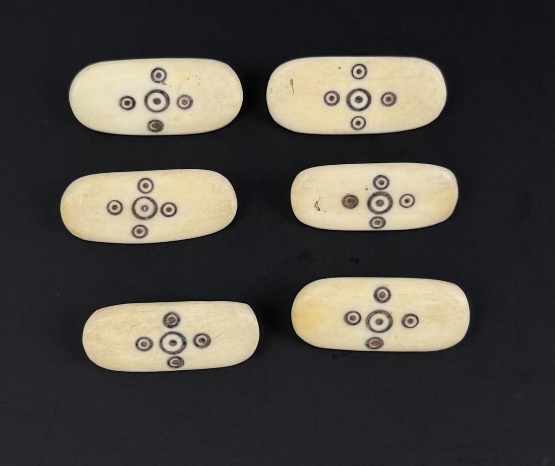 Alaskan Inuit Eskimo Ivory Buttons: 1" by 1/2". Native made prior to 1972. This item cannot be shipped to Oregon, California, Hawaii, New York, New Jersey, Internationally, or any other state that prohibits.