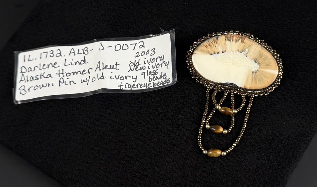 Darlene Lind Alaskan Inuit Eskimo Ivory Brooch: 2 1/4" by 1 5/8". Native made prior to 1972. This item cannot be shipped to Oregon, California, Hawaii, New York, New Jersey, Internationally, or any other state that prohibits.
