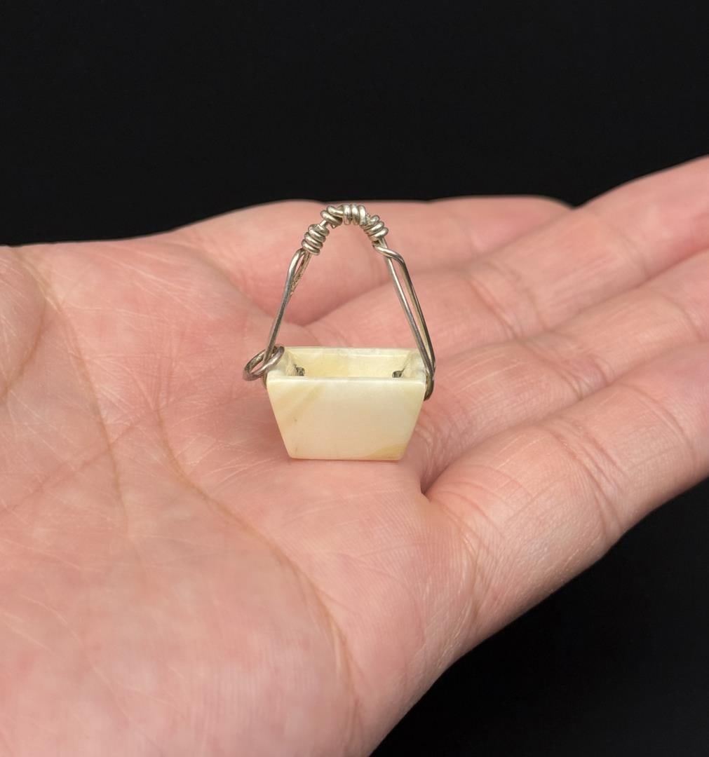 Alaskan Inuit Eskimo Sterling Ivory Bucket Charm: 1" by 5/8" by 3/8". Native made prior to 1972. This item cannot be shipped to Oregon, California, Hawaii, New York, New Jersey, Internationally, or any other state that prohibits.