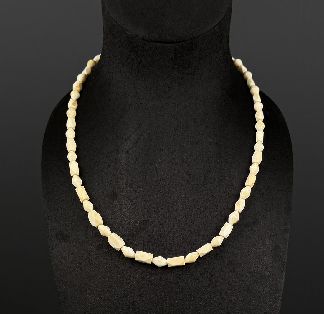 Alaskan Inuit Eskimo Ivory Necklace: 11 1/2" long a displayed. Native made prior to 1972. This item cannot be shipped to Oregon, California, Hawaii, New York, New Jersey, Internationally, or any other state that prohibits.