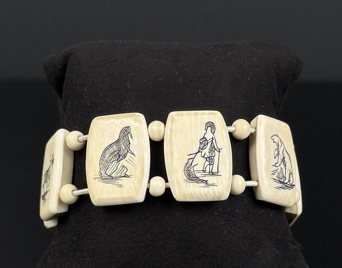 Alaskan Inuit Eskimo Scrimshaw Panel Bracelet: Native made prior to 1972. This item cannot be shipped to Oregon, California, Hawaii, New York, New Jersey, Internationally, or any other state that prohibits. 7 1/2" circumference.