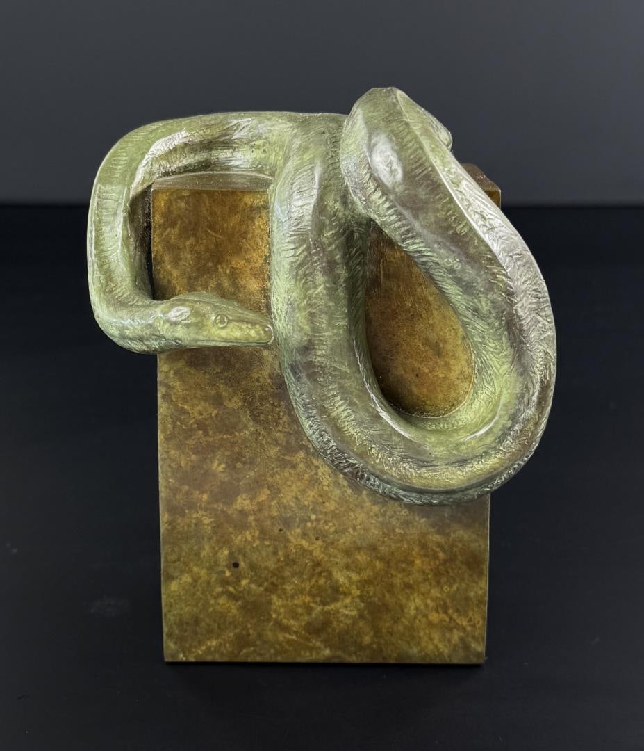 Tony Hochstetler Sophie the Boa Bronze: Title is Sophie the Boa. 5 1/2" by 4 1/8" by 3 1/2". 3/100. Tony Hochstetler. Born 1964 Indiana. Known for: Realistic sculpture-fish, reptiles and amphibians. Sculptor Tony Hochstetler is a sculptor