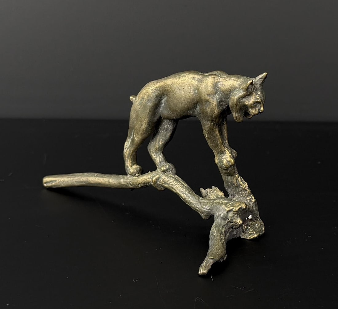 Philip R Goodwin Bobcat Bronze: Title is Bobcat. 5 1/2" by 3 1/8" by 2 1/8" Philip Russell Goodwin (1881 - 1935) was active/lived in New York, Connecticut. Philip Goodwin is known for Animal, field-stream illustration. Known for