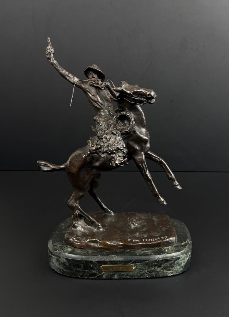 Charles M Russell Bronze Smokin Up: Title is Smokin Up. 12 5/8" by 9 1/8" by 6". Charles Marion Russell (1864 - 1926) was active/lived in Montana, California, Missouri. Charles Russell is known for Indian-frontier genre painting,