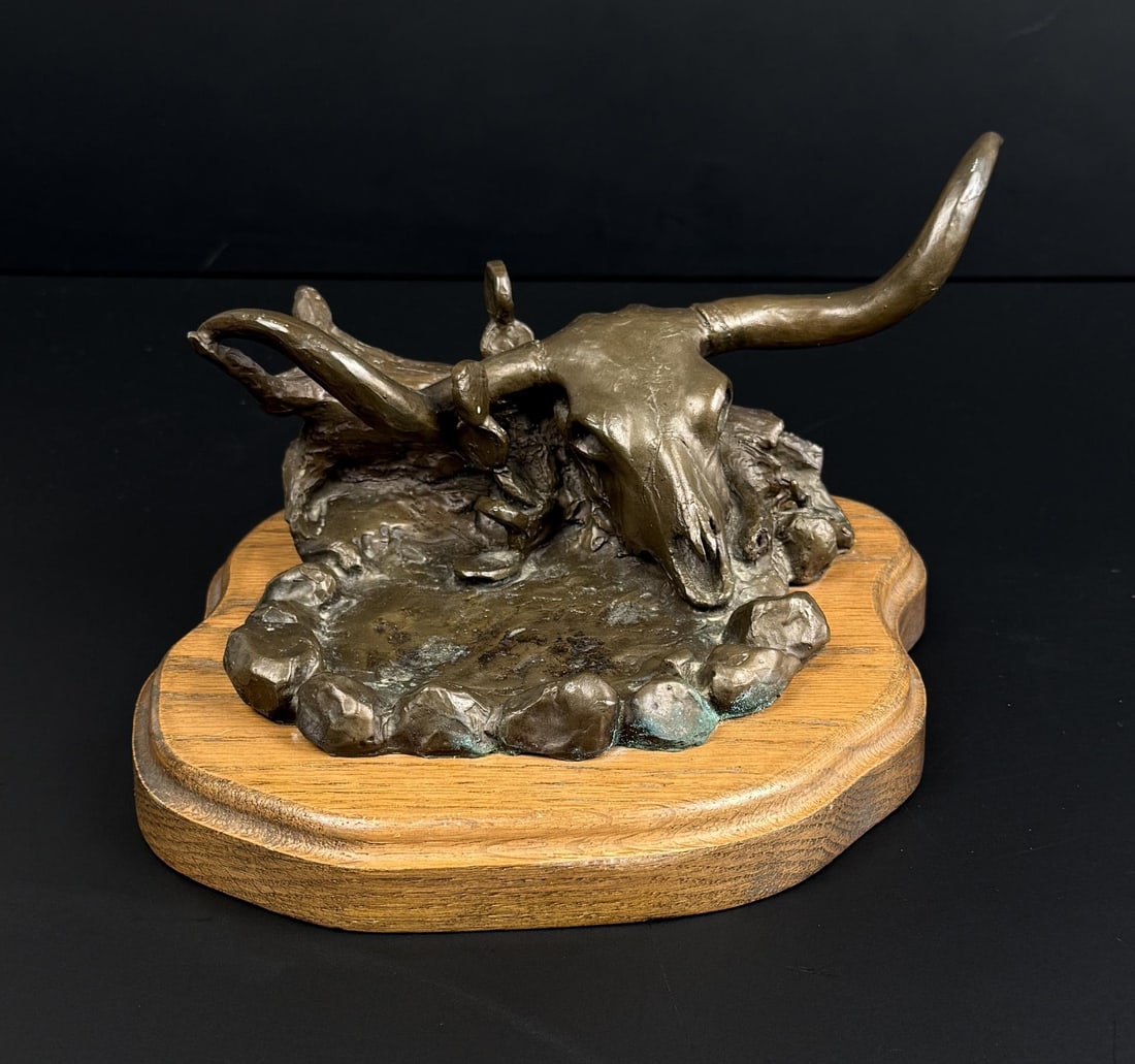 Gerry Metz Longhorn Skull Bronze: Title is Longhorn Skull. 7 1/2" by 7 1/2" by 4 3/4". Gerry Michael Metz (1943 - 2018) was active/lived in Arizona, Illinois. Gerry Metz is known for Frontier-Indian genre, sculptor. Gerry Metz is a