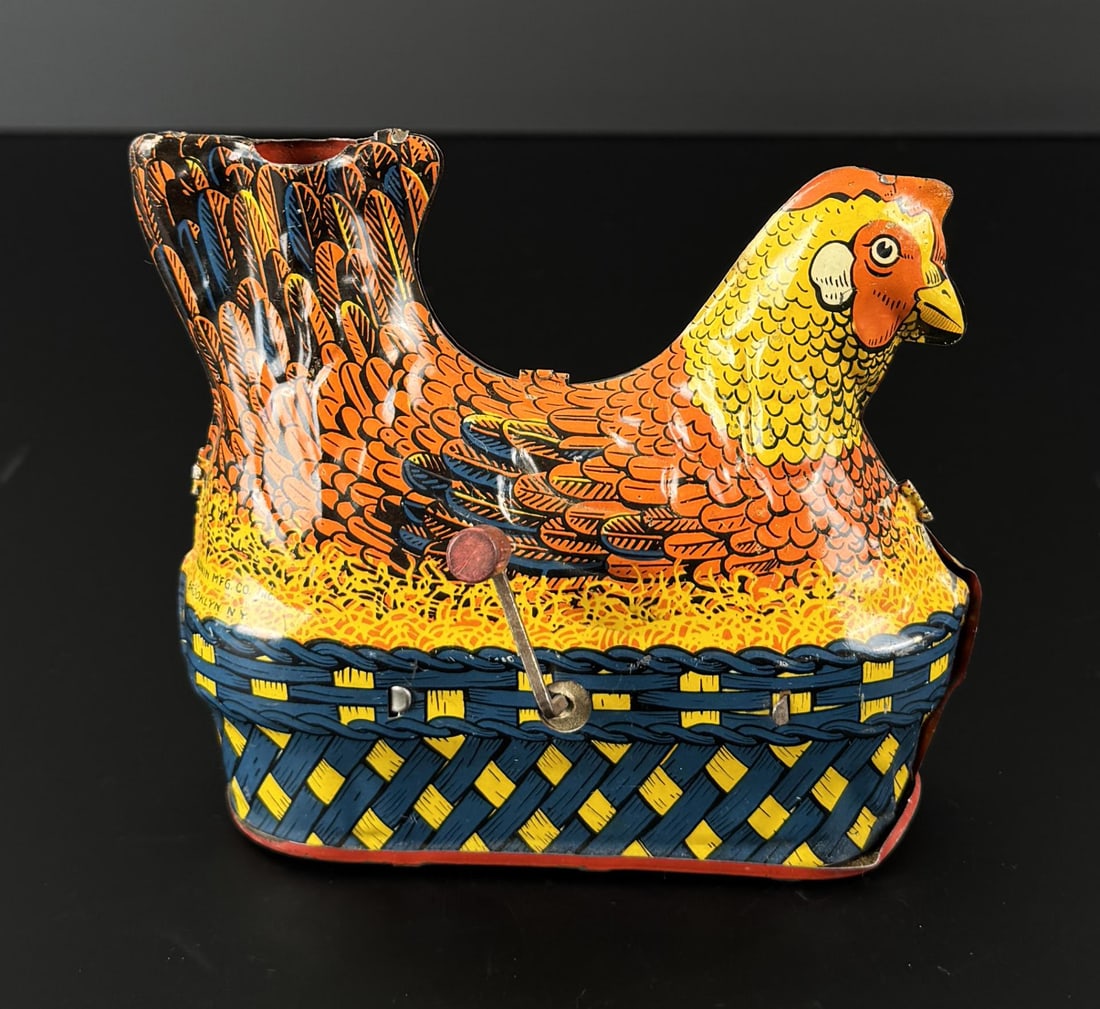 Baldwin Tin Litho Wind Up Little Red Hen Toy: 5 1/4" by 4 7/8" by 3". In working condition.