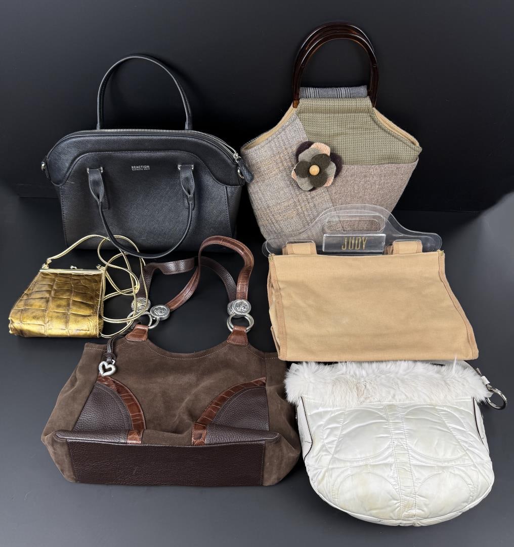 Collection of Assorted Purses Handbags: Nice grouping. Brighton, Kenneth Cole, Coach, and Baabaa Zuzu are a few of the brands represented in this lot.
