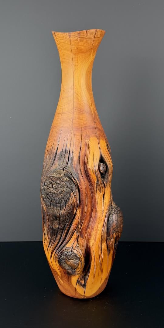 Earth Gems Cedar Wood Burl Vase: 5 3/8" by 20" tall.
