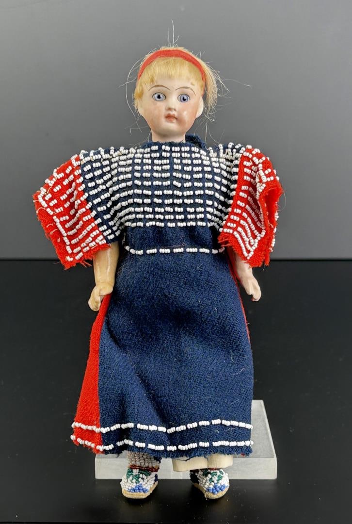Montana Crow Native American Indian Beaded Doll: 9 1/2" Tall. Reservation period, made with a Trading Post traded composition doll. First Quarter of the 20th Century.