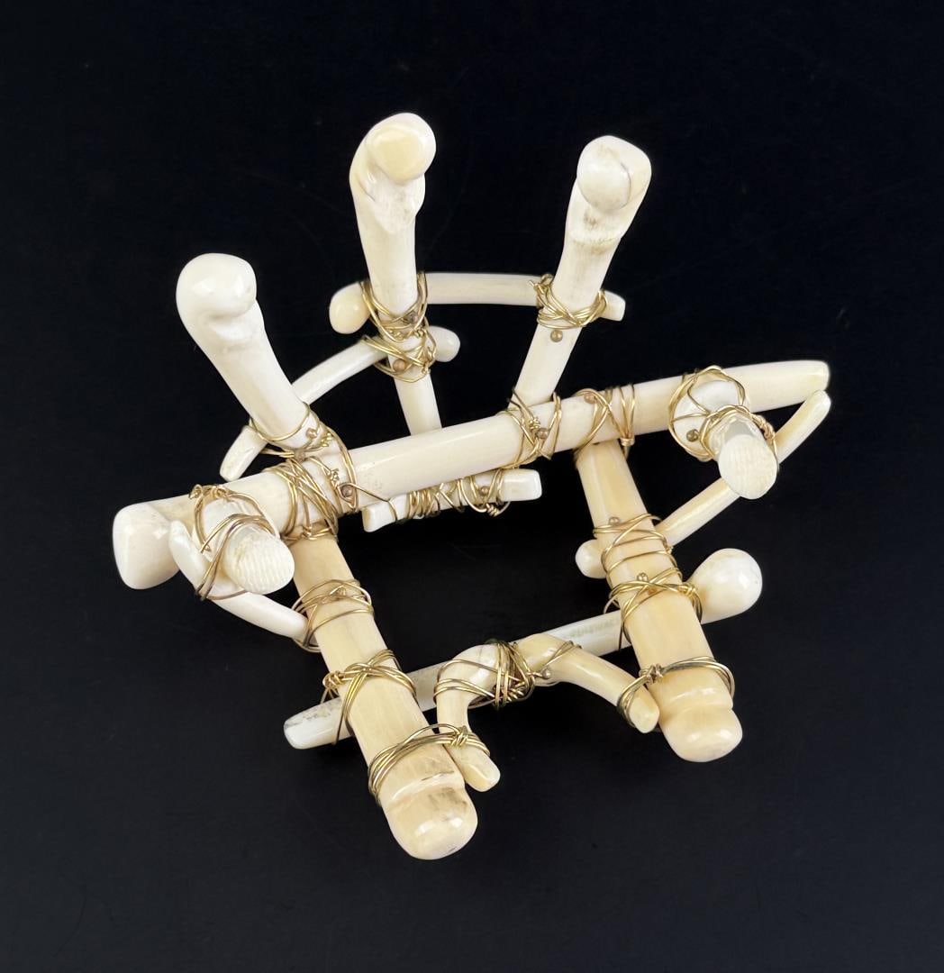 14k Gold Alaskan Inuit Eskimo Ivory Chair: Miniature chair figure, likely a seat from a dog sled. 65.77 grams total. 3 3/4" by 3 1/2" by 2 1/4". Native made prior to 1972. This item cannot be shipped to Oregon, California, Hawaii, New York, Ne