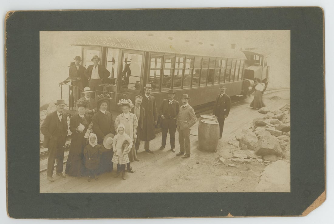 Hiestand Manitou Pikes Peak Railway Cabinet Photo: 6" by 9". 1901. Manitou & Pike's Peak Railway in Colorado. Shows people posing in front of the train. Photographed by J.G. Heistand.
