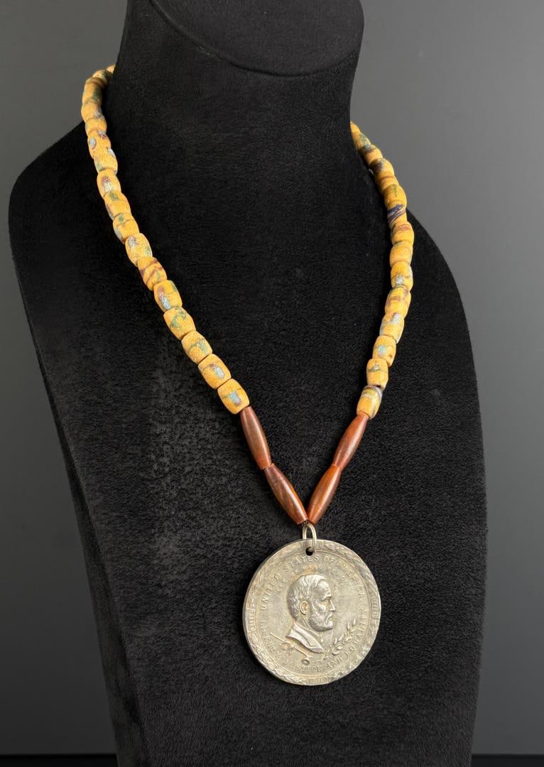Ulysses S Grant Indian Trade Bead Peace Medal: 15 1/2" long as displayed. These medals were given to Native Americans by European Powers. Medal is a reproduction.