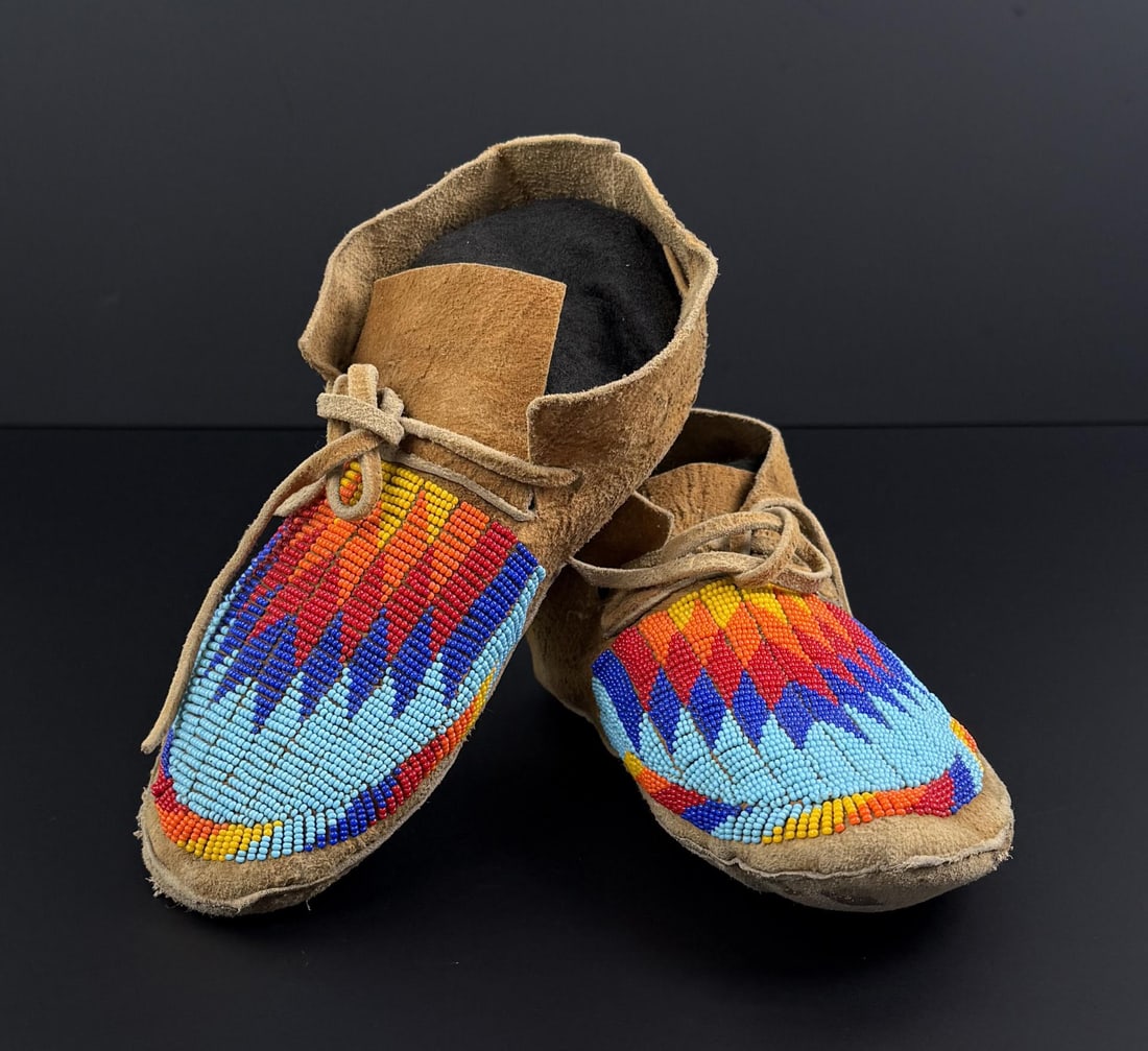 Montana Blackfoot Indian Beaded Moccasins: 4 1/2" wide by 9 1/4" long. Mid 20th Century.