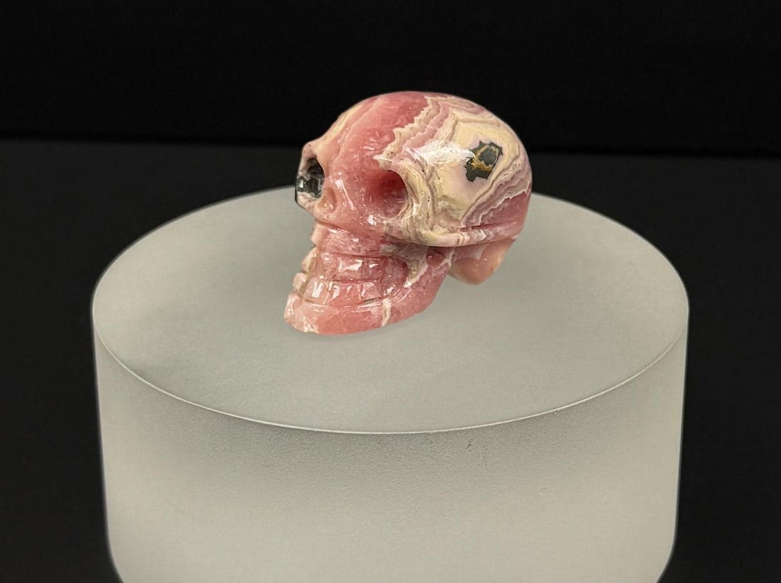 Rhodochrosite Skull Carving: 1 3/4" by 1" by 1". 59.5 grams.