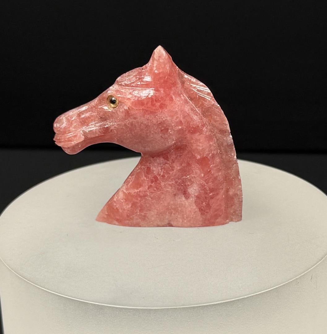 Rhodochrosite Horse Head Carving: 2" by 1 5/8" by 1/4". 27.0 grams.