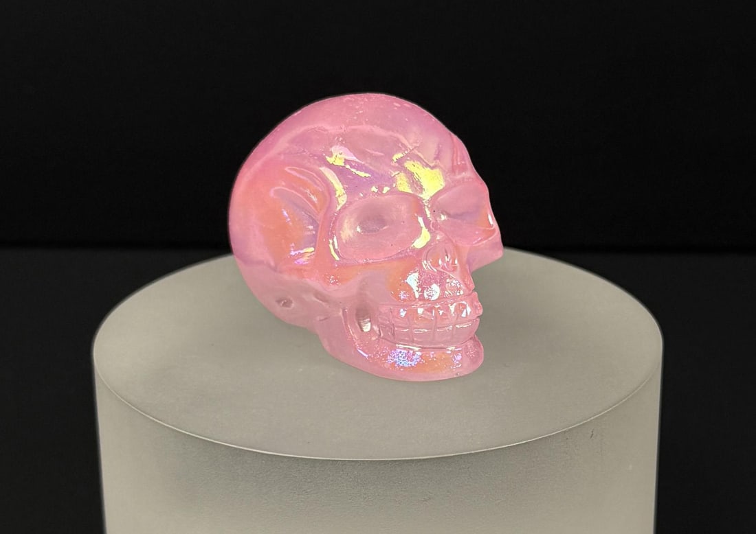Aura Quartz Skull Carving: 1 7/8" by 1 3/8" by 1 3/8". 90.3 grams.