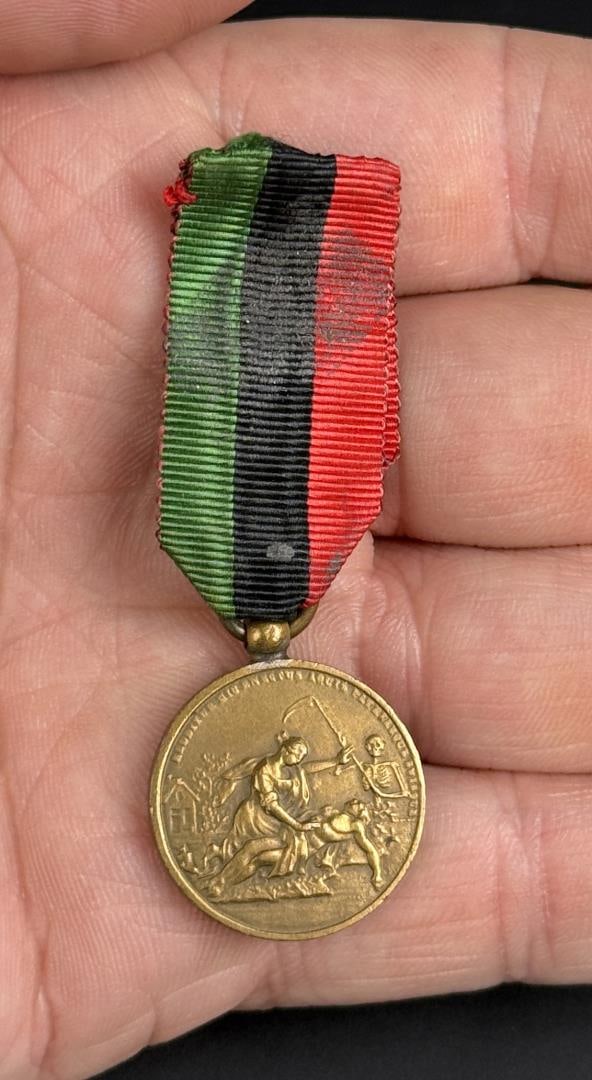 Named Life Saving Society of Amsterdam Medal: Awarded to C.V. Valkenburg, of Woerdense Verlaat, 24th of November 1950. Issued by the Dutch "Society for the Saving of Drowning Victims", and is the oldest Dutch decoration still in existence. It