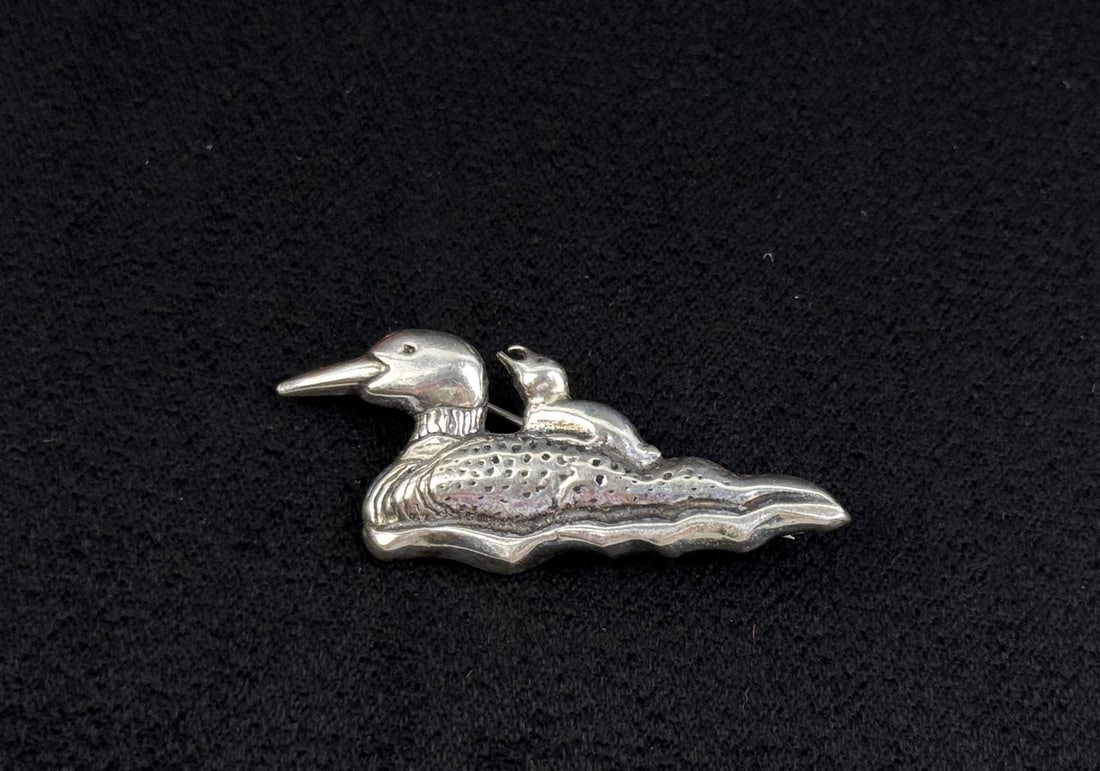 Sterling Silver Loon Brooch: 8.12 grams. 1 3/4" long.