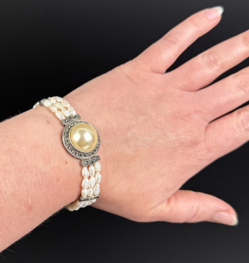 Sterling Marcasite Freshwater Pearl Bracelet: 6 3/4" inner circumference. 19.44 grams.