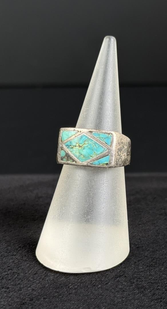 Zuni Sterling Silver Turquoise Inlaid Ring: Size 7 1/4. 9.21 grams.