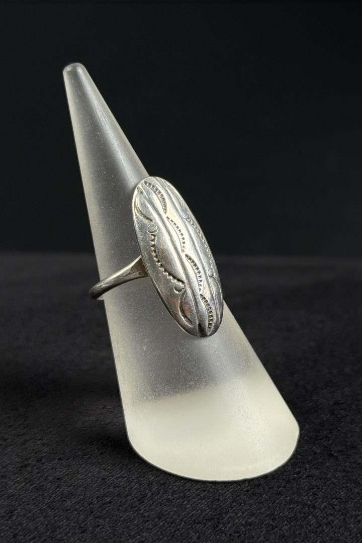 Navajo Sterling Silver Concho Pattern Ring: Size 7 1/4. 4.25 grams.