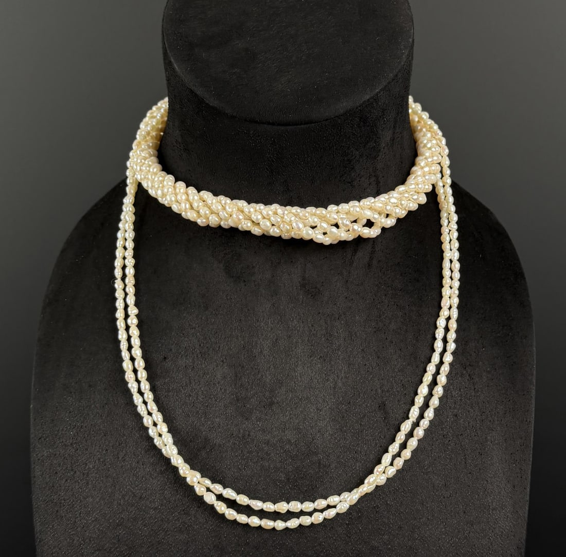 Freshwater Pearl Necklace: Necklace is 23 1/4" long.