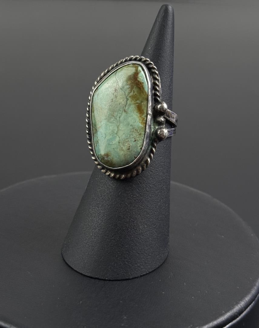 Navajo Sterling Silver Turquoise Ring: Size 6. 9.7 grams.
