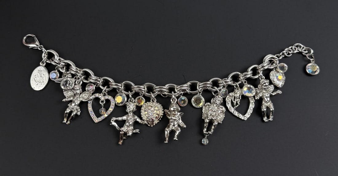 Kirks Folly Cherub Rhinestone Charm Bracelet: 7 1/4" inner circumference.