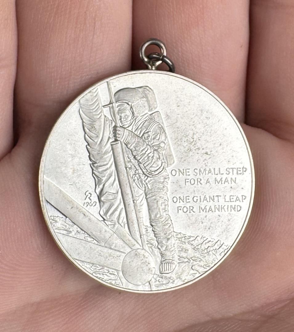 Sterling Silver First Step On Moon Medal Coin: 14.51 grams, 1 1/4" round.