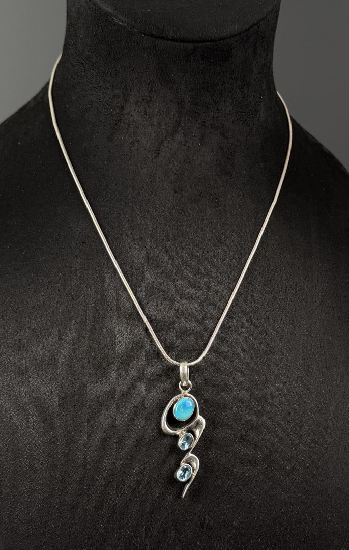 Sterling Silver Blue Topaz Larimar Necklace: 12 7/8" long as displayed. 20.77 grams.