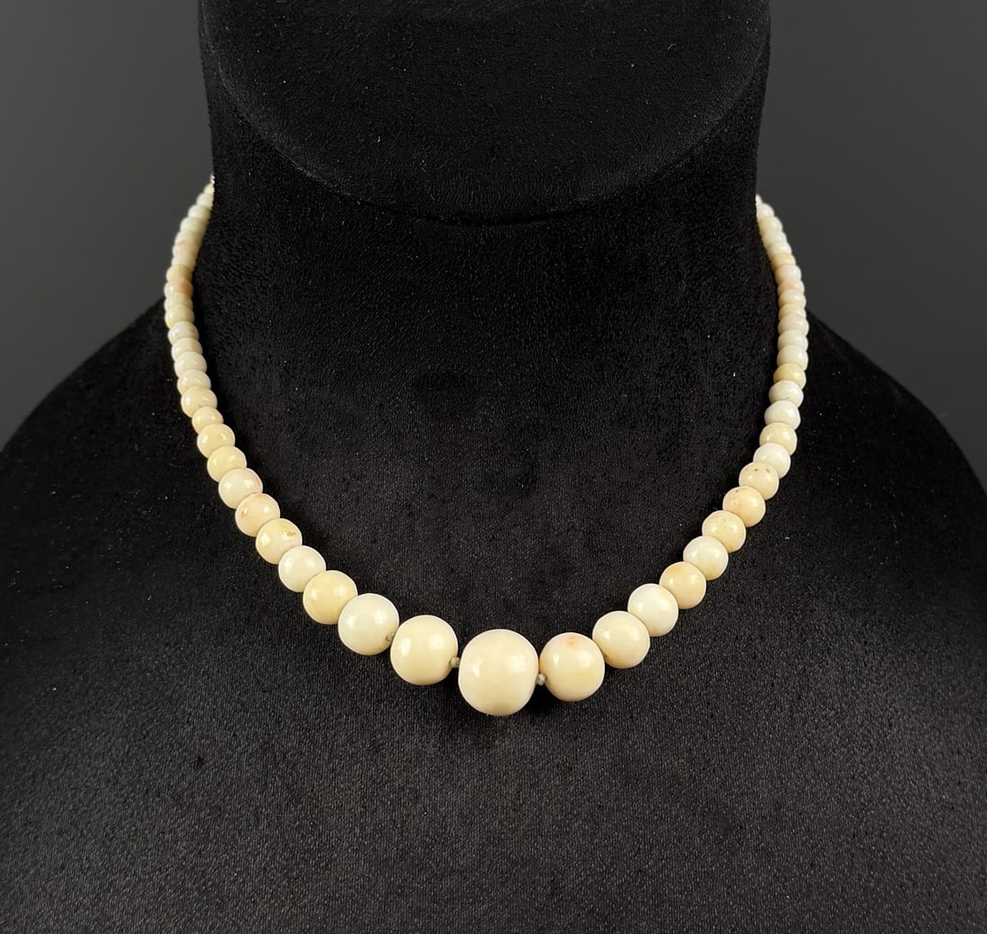 Sterling Silver White Coral Ball Bead Necklace: 8 3/8" long as displayed.