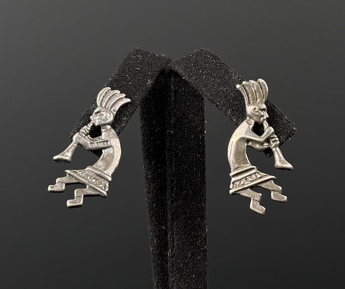 Navajo Sterling Silver Kokopelli Earrings: 7/8" by 1/4". 3.85 grams.