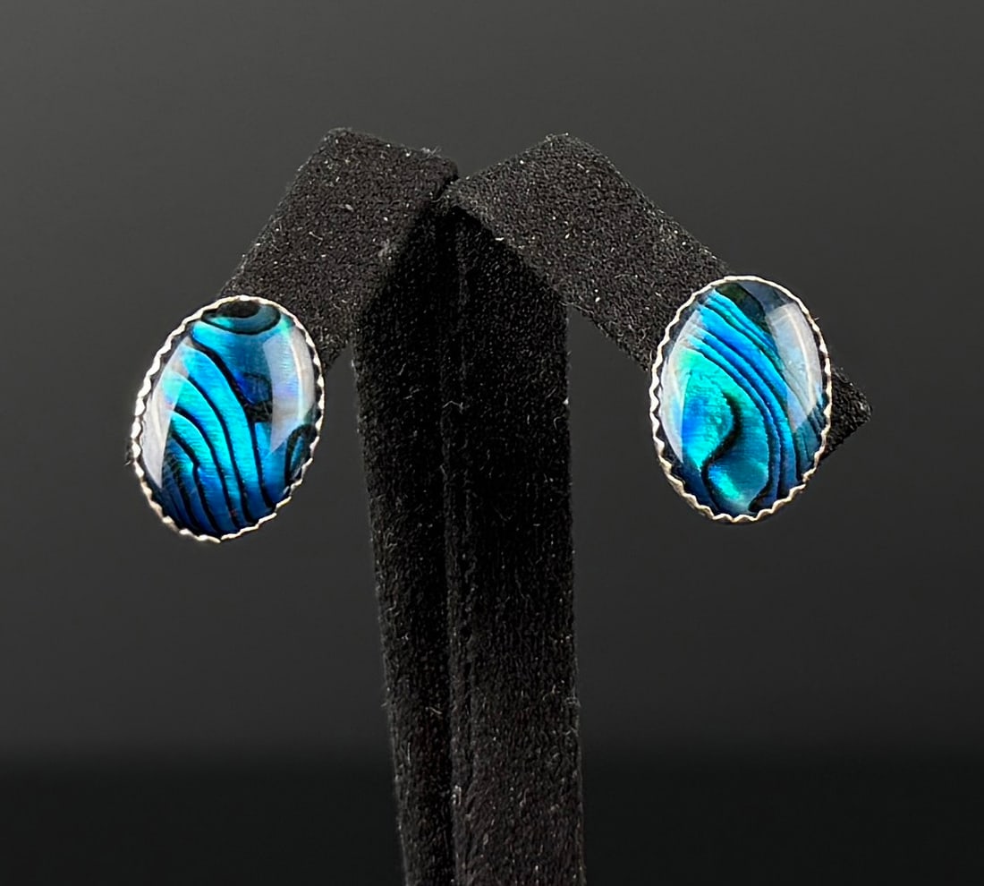 Sterling Silver Abalone Earrings: 1/2" by 1/4". 1.80 grams.